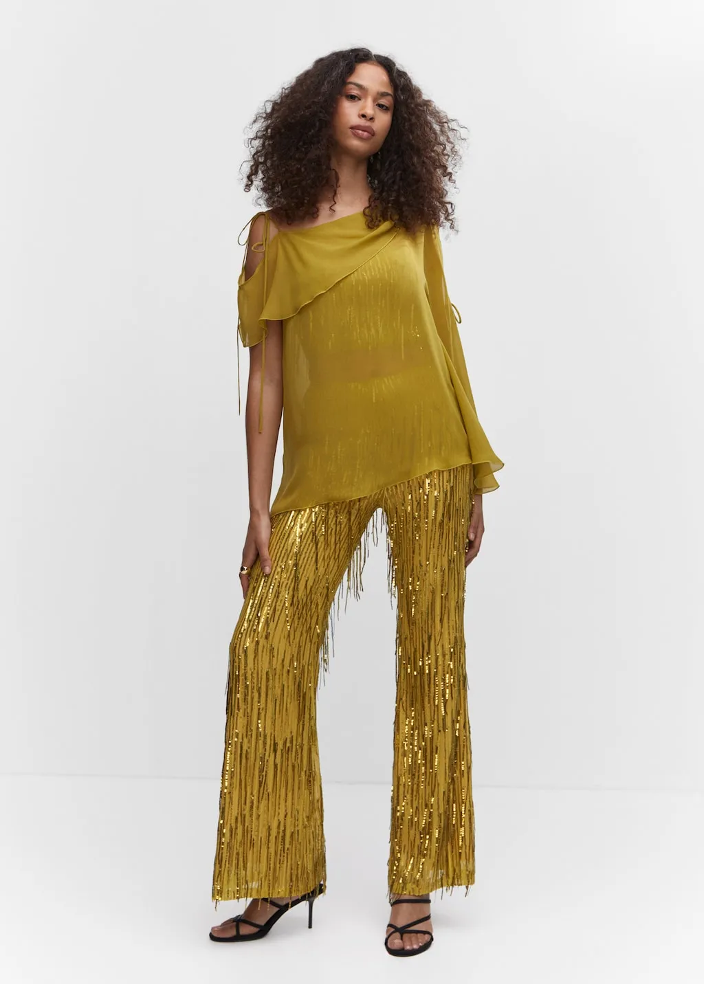 Pantaloni frange metallizzate